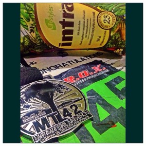 My trail partner, Intra Juice, gave me a boost to get this very nice finisher's medal.